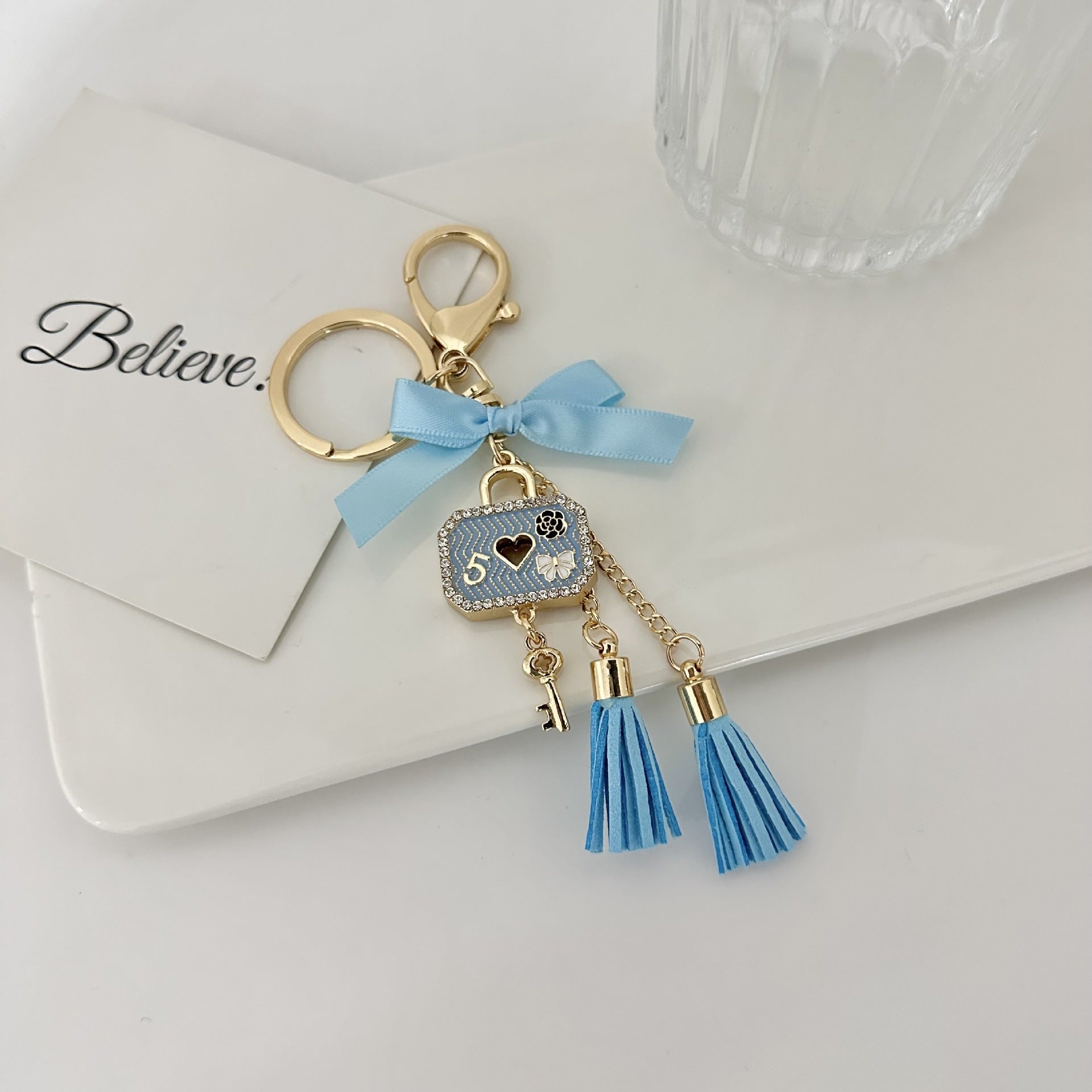 Wholesale Zirconia Bow Metal Tassel Keychain
